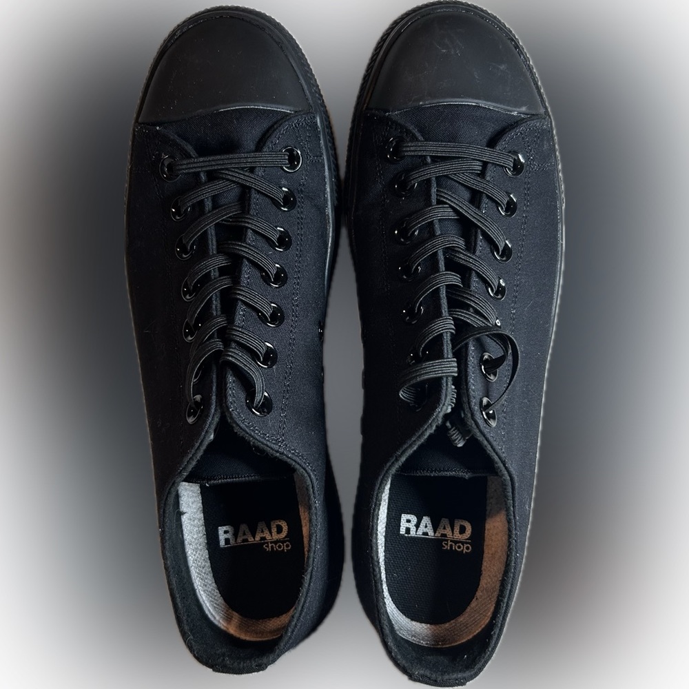 RAAD black low top sneakers